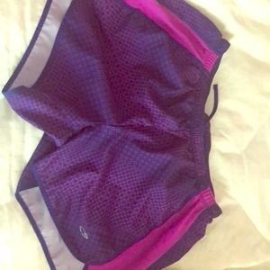 Purple running shorts